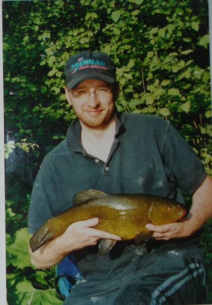 Adam Carter with a nice tench
